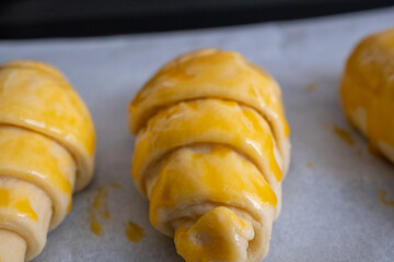 raw croissant with butter