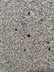 Closeup of Concrete with Holes Texture Background