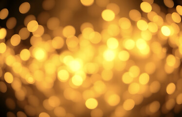 Obraz premium Golden Christmas background with abstract bokeh effect. Blurred glittering lights and sparkles create a luxurious atmosphere. Magical festive background with space for text, perfect for greeting cards