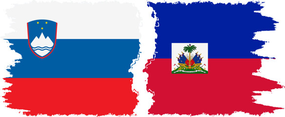 Haiti and Slovenia grunge flags connection, vector