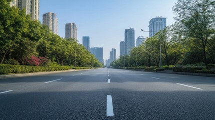 Fototapeta premium Empty Road Through Cityscape