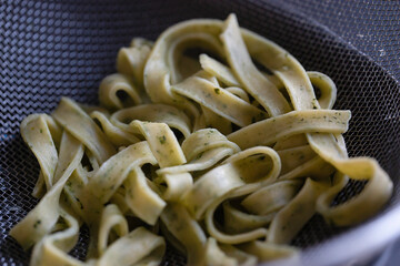 cooked pasta in a colander