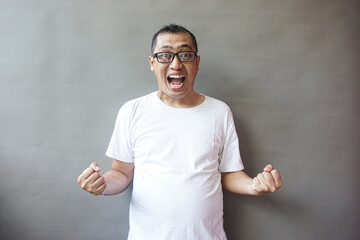 Excited Man Celebrating Success Portrait of Joyful Expression