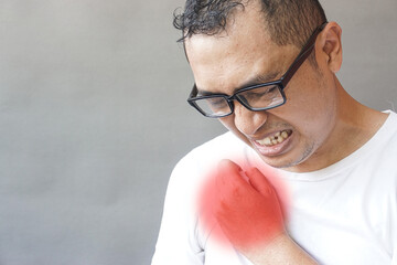Man Experiencing Severe Chest Pain A Medical Image