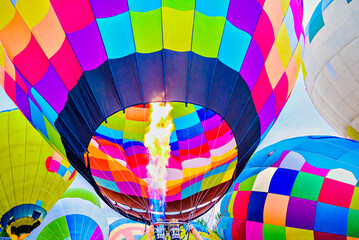 Obraz premium Preparing a hot air balloon to start the flight, heated by hot air