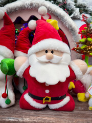 Father Christmas Cuddly Plushy in a Snowy Grotto Scene