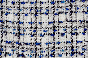White, blue and black checkered fabric background