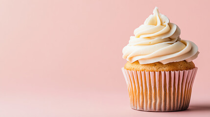 Delicious cupcake with creamy frosting on a soft pink background, perfect for desserts, bakery promotions, or celebrating special occasions.