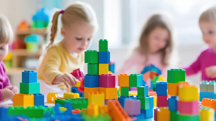 Toddlers playing with colorful building blocks in a bright playroom