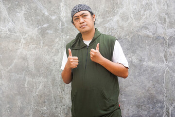 Portrait of a Man Giving Two Thumbs Up, Positive Feedback Gesture
