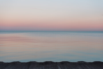 Pastel Tranquility: Sunset Over Water