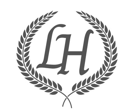 Initial letter L and H, LH monogram logo design with laurel wreath. Luxury calligraphy font.