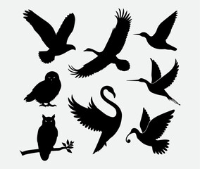 set of silhouettes of birds