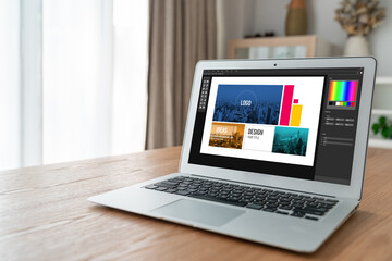 Fototapeta premium Graphic designer software for modern design of web page and commercial ads showing on the computer screen
