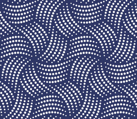 Abstract geometric design with twisted white dotted lines in the shape of vortexes on a blue background. Small dots and circles design. Seamless repeating pattern. Dotty modern style.
