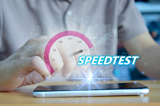 fast internet connection speedtest network bandwidth technology Man using high speed internet with smartphone and laptop computer. 5G quality, speed optimization..