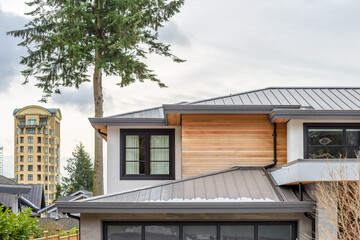 luxury house with big tree and nice landscape at winter in Vancouver, Canada