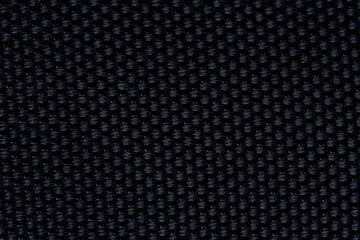 Black macro fabric texture,Close-up background of black fabric or abstract black fabric texture. Black background.