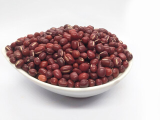 red beans in a wooden spoon