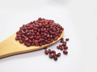 red beans in a wooden spoon