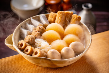 Japanese Oden, fish cake and vegetable stew.
Oden is a stew made with boiled eggs, radish (daikon), fish cakes and stock (dashi).