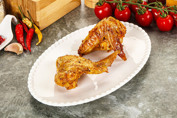 Tasty roasted chicken wing with spices
