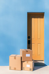 Packages by the door with shadows on the wall, delivery concept, background