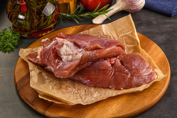 Raw uncooked turkey thigh fillet