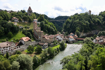 Fototapeta premium Freiburg Switzerland old town with river and city walls, establishing wide shot