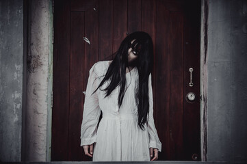 Portrait of asian woman make up ghost,Scary horror scene for background,Halloween festival...