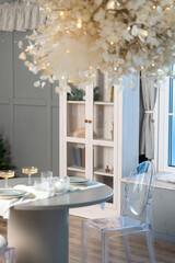 New Year's decor in bright colors with a festive tree.