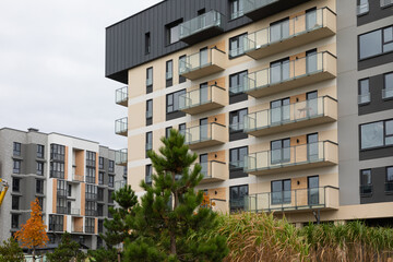 New high-rise residential buildings showcasing modern architecture and rental opportunities in an urban neighborhood
