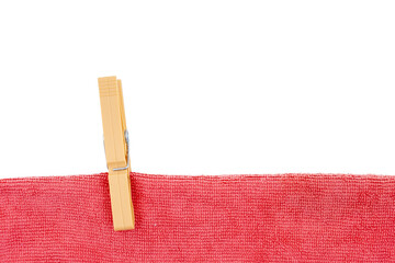 a towel hanging with a clothespin on a transparent background