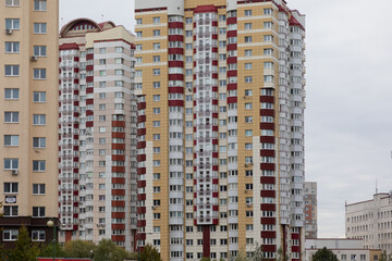 High-rise residential buildings in a city area showcasing modern living and housing options for...