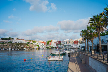 Obraz premium view of Cales Fonts port in the morning with small boats and restaurants in the city of Mahon and Es Castell in the island of Menorca in the balearic islands of Spain
