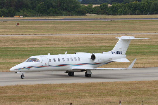 M-ABEU, Bombardier Learjet 45, operated by Ryanair to transport crew and staff, arriving at London Stansted Airport, Essex, UK on 24 August 2022