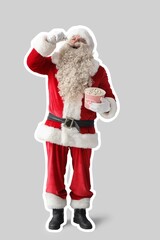 Santa Claus eating tasty popcorn on grey background