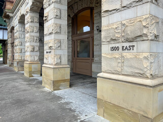 The building has a stone facade and a sign that says 1500 East. Main Street Station, Richmond. Virginia