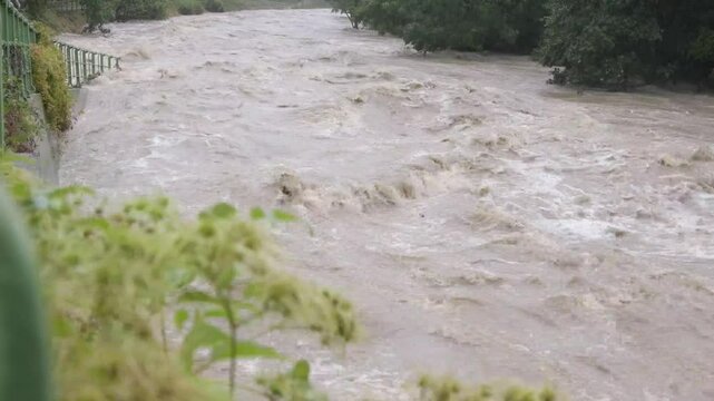 a massive flood transforms a peaceful riverbank in