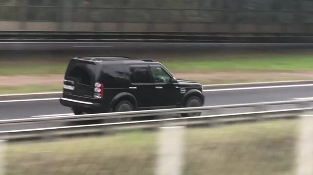 pursuit of a black suv, high speed
