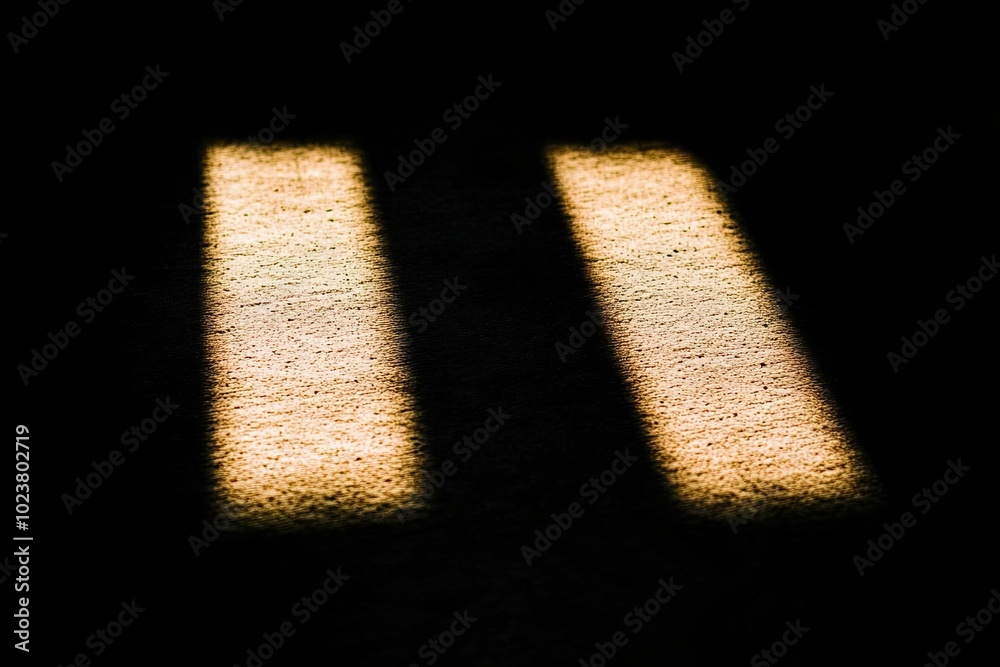 Poster Soft Light Spots on a Dark Surface Create a Striking Visual Contrast in a Serene Setting