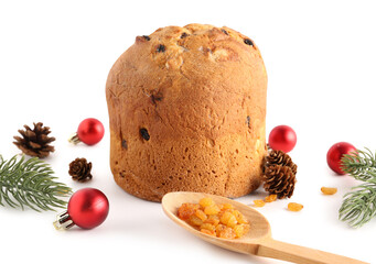 Tasty Panettone with Christmas balls, fir branches and cones on white background