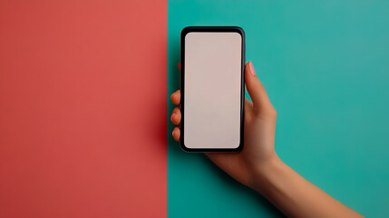 A close-up shot of a woman's hand using a smartphone, isolated against a pastel wall.