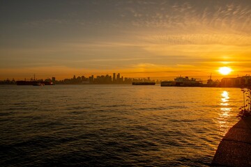 Sunset over Vancouver bay with city