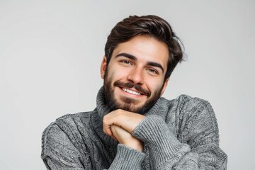 Obraz premium Confident young man in casual attire smiling and thinking positively.