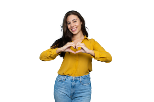 Portrait of a young businesswoman making a heart sign with her hands - Powered by Adobe