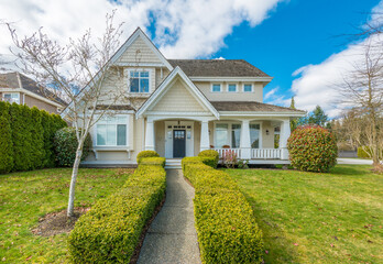 Fragment of a luxury house with a garage door in Vancouver, Canada. Horizontal orientation.