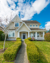 Fragment of a luxury house with a garage door in Vancouver, Canada. Horizontal orientation.