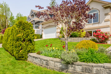 Fragment of a luxury house with a garage door in Vancouver, Canada. Horizontal orientation.