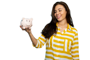 Young woman showing off her piggy bank